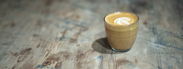 Flat white coffee on a table